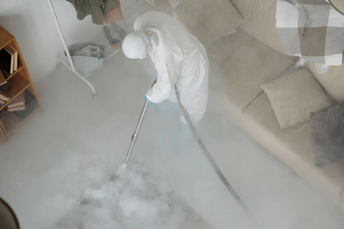 Biohazard cleanup technician in protective equipment, North Auburn, CA